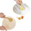 The bread proofing kit includes a 9-inch round and a 10-inch oval proofing basket, and a set of baking tools including a bread knife, dough scraper